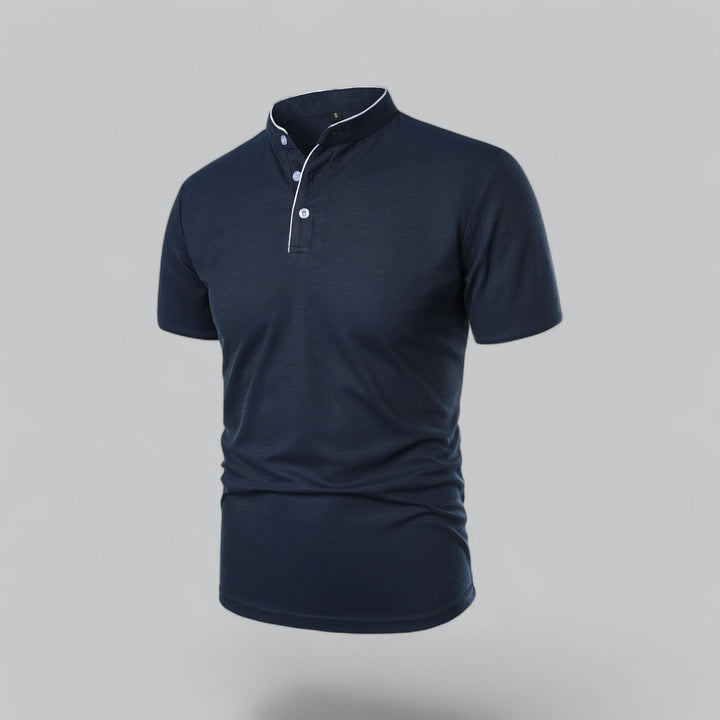 Men's collarless polo shirt styled with jeans for a relaxed, smart casual look. Short sleeve & versatile.