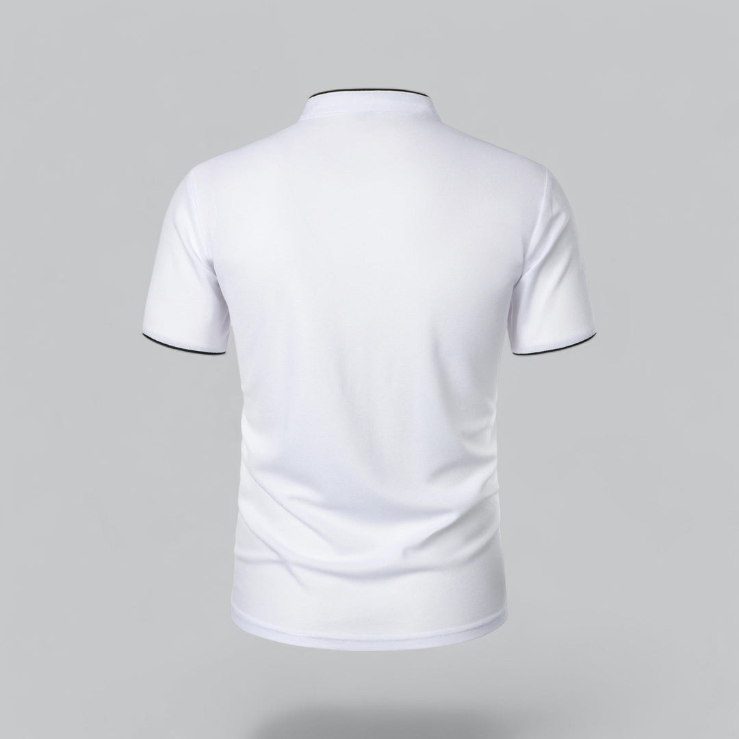 Man standing, wearing a stylish collarless polo shirt, short sleeve, modern fit men's fashion. Casual top.