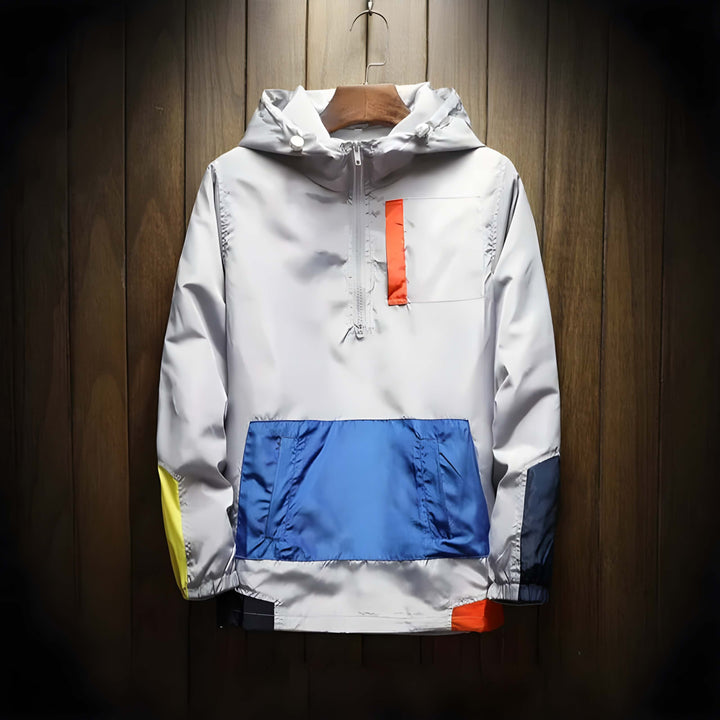 Men's color block hooded half-zip windbreaker jacket. Lightweight outerwear for casual and athletic wear.