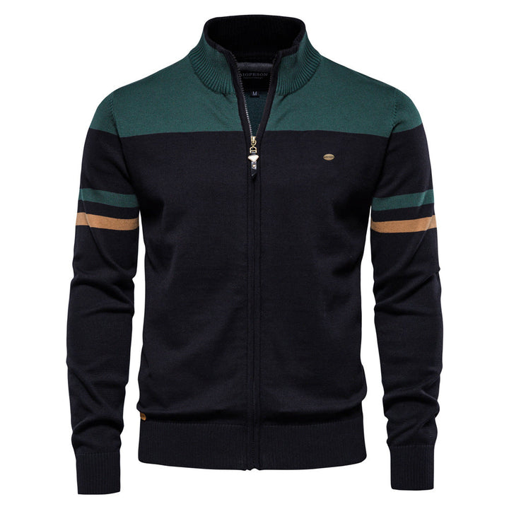 Side view of a man wearing a stylish colorblock zip-up cardigan sweater, long sleeve, lightweight.