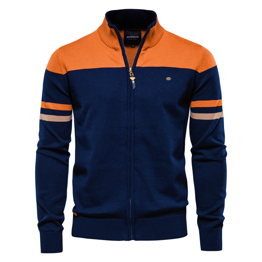 Detail of the zipper closure on a men's colorblock cardigan sweater, quality outerwear.