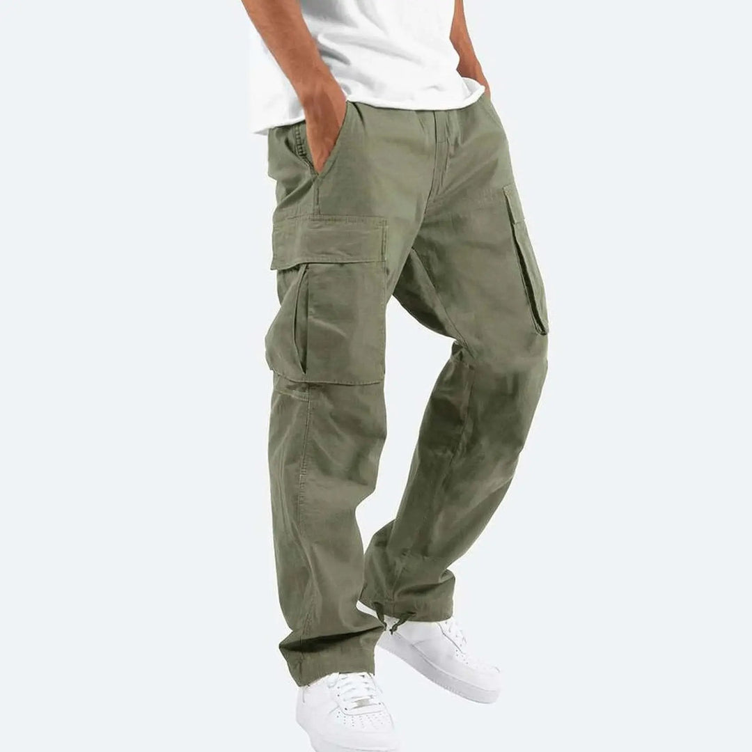 Relaxed fit men's cargo pants in green, featuring an adjustable drawstring and spacious side pockets for everyday utility.