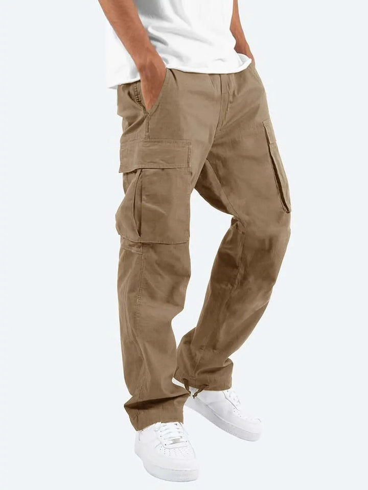 Grey men's casual cargo pants, offering a comfortable drawstring waist, relaxed fit, and ample storage pockets.
