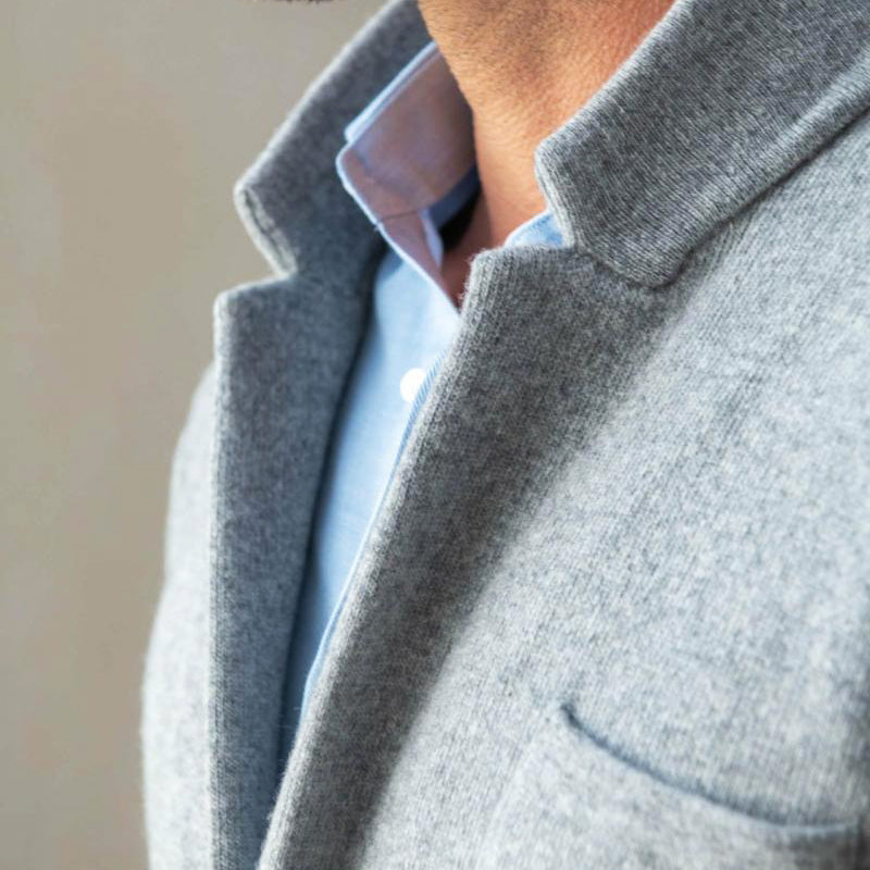 Men's fashion blazer with a comfortable feel & modern fit. Features classic patch pockets, suitable for many occasions.