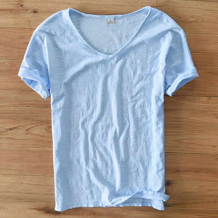 Man modeling a comfortable V-neck t-shirt, a relaxed fit staple for summer casual wear.