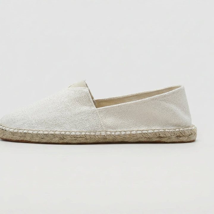 Comfortable men's espadrille slip-ons, essential summer footwear for relaxed style.