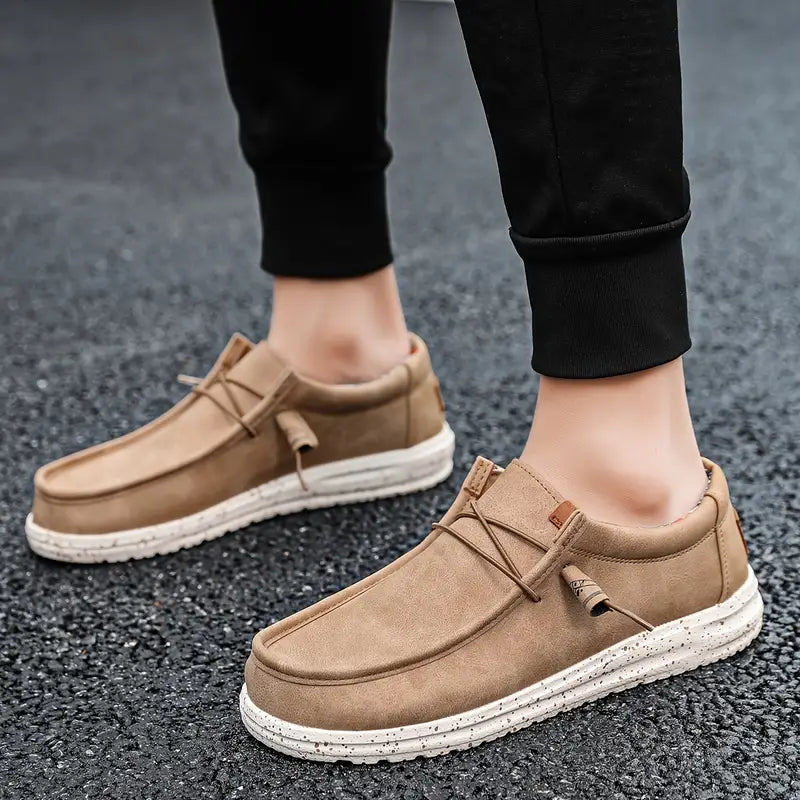 Stylish men's slip-on loafers in a comfortable design, great for everyday casual fashion and easy wear.