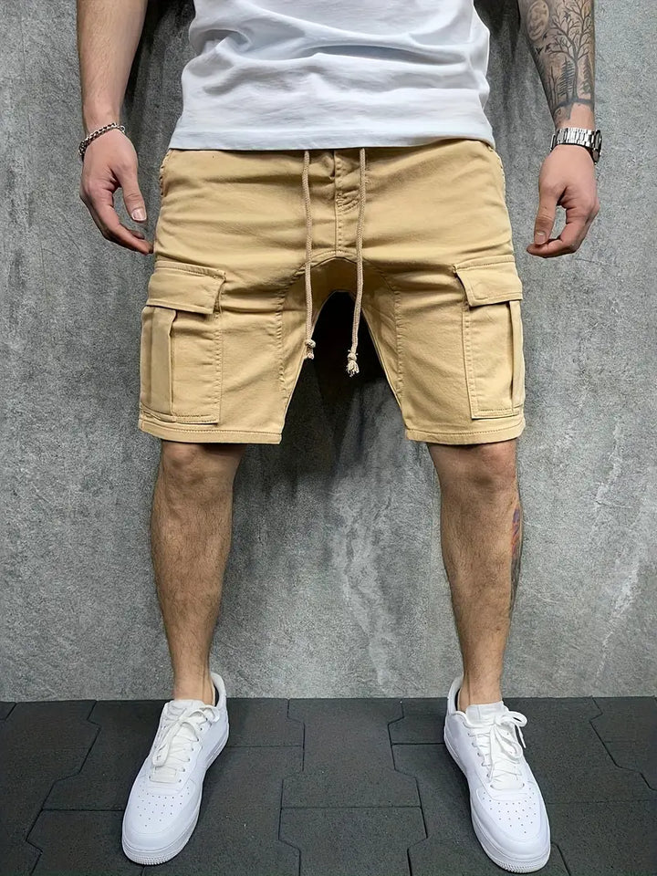 Athletic men's cargo shorts with elastic drawstring waist for ultimate comfort. Stylish utility & activewear.