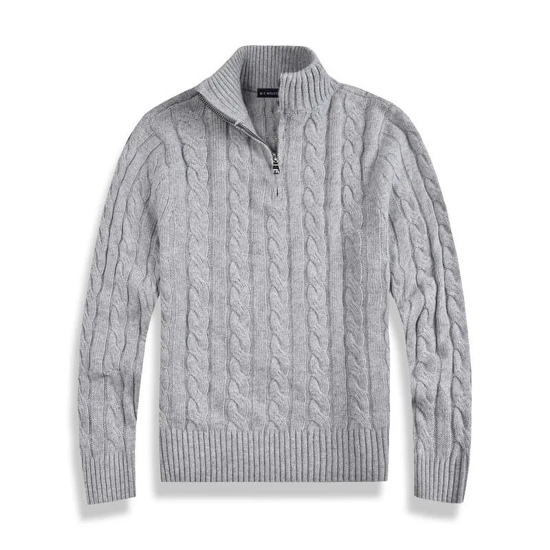 Warm men's cable knit half-zip pullover. Ideal cozy winter fashion for casual layering.