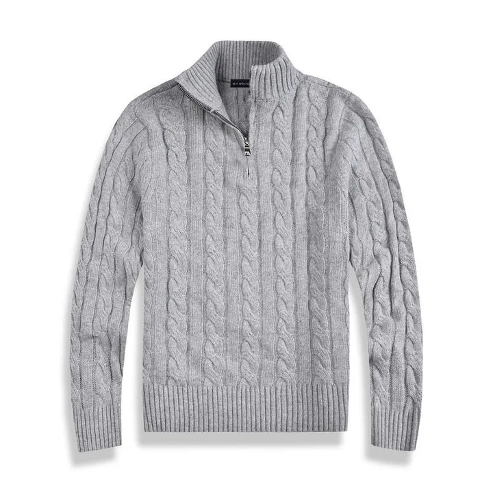 Warm men's cable knit half-zip pullover. Ideal cozy winter fashion for casual layering.
