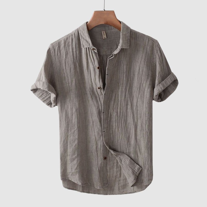 Stylish men's relaxed fit crinkle shirt with short sleeves, perfect for a modern summer look.