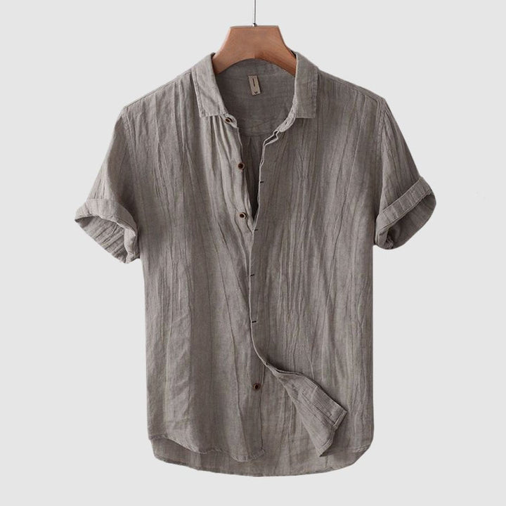 Stylish men's relaxed fit crinkle shirt with short sleeves, perfect for a modern summer look.