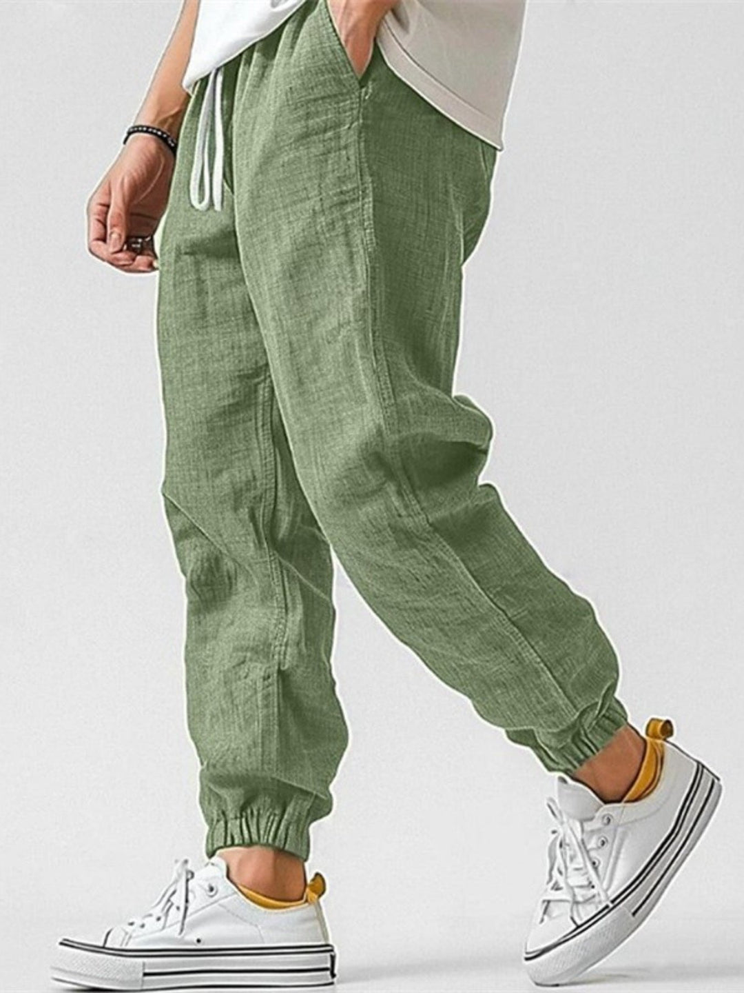 Versatile men's cuffed pants for effortless casual style. Relaxed fit for travel, everyday wear & comfort.