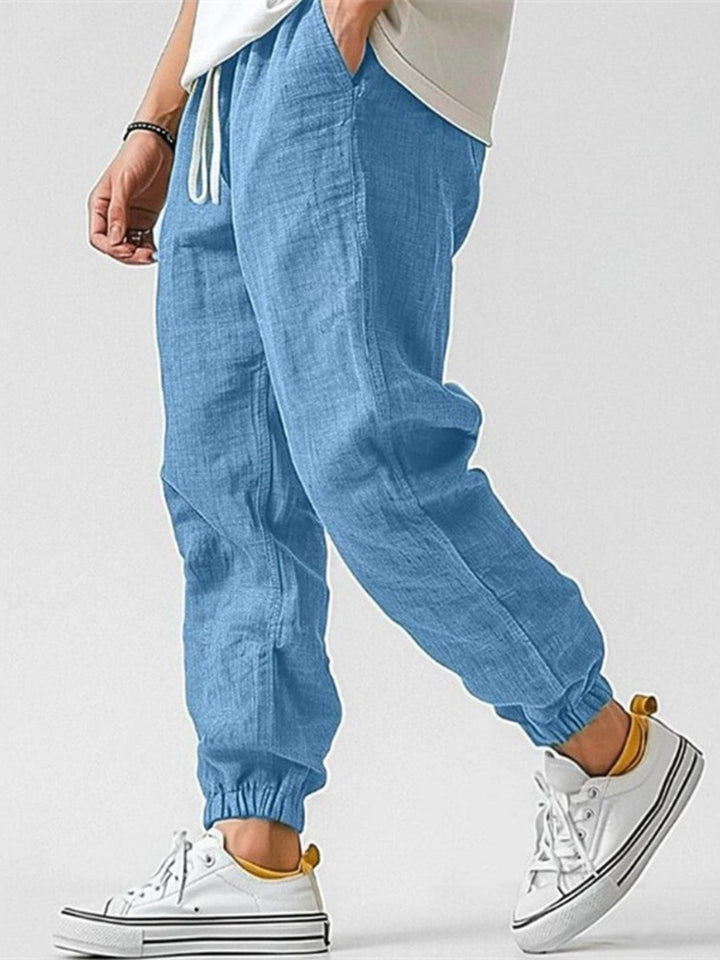Comfortable men's cuffed joggers with a relaxed fit. Essential casualwear for everyday comfort and style.