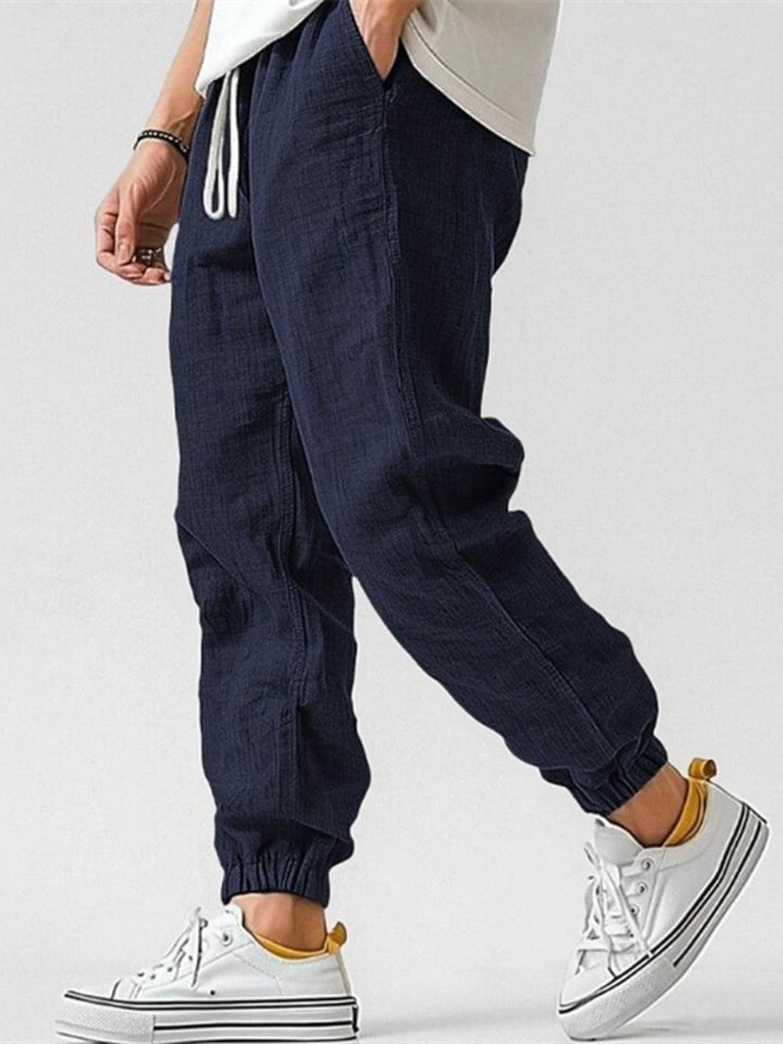 Men's relaxed fit joggers for spring & summer. Cuffed trackpants perfect for travel & casual outings.