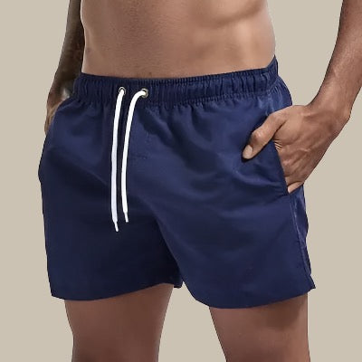 Men's quick dry swimwear trunks, drawstring waist for ultimate comfort at the beach & pool.