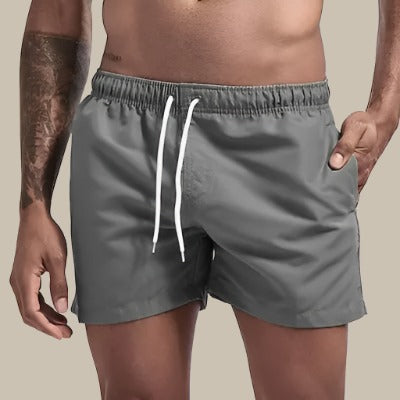 Men's athletic beach shorts, quick dry & comfortable drawstring waist for pool and summer.