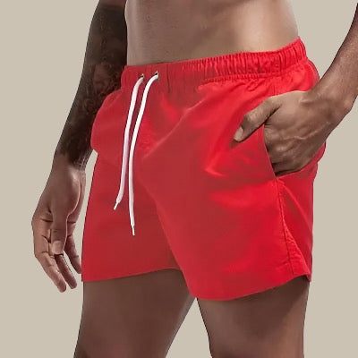 Athletic men's swim trunks, quick dry for beach & pool; comfortable drawstring waist for summer.