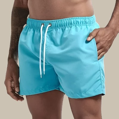 Versatile men's swimwear: drawstring waist swim shorts for beach, pool, and casual summer wear.