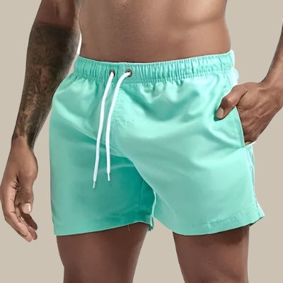 Men's quick-dry pool shorts; ideal for summer vacation & beach activities; adjustable drawstring waist.