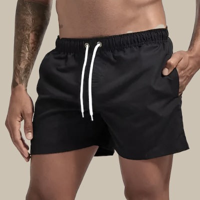Comfortable men's drawstring swim shorts, quick dry fabric for beach, pool, and active summer days.