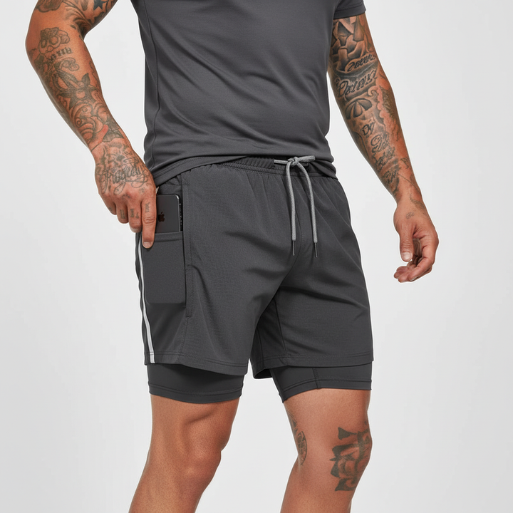 Man running in RunVibeX dual-layer running shorts, showcasing freedom of movement & phone pocket.