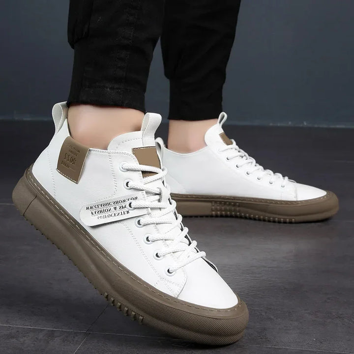 Stylish white men's everyday sneakers, perfect for casual outfits, blending athletic performance with comfort.