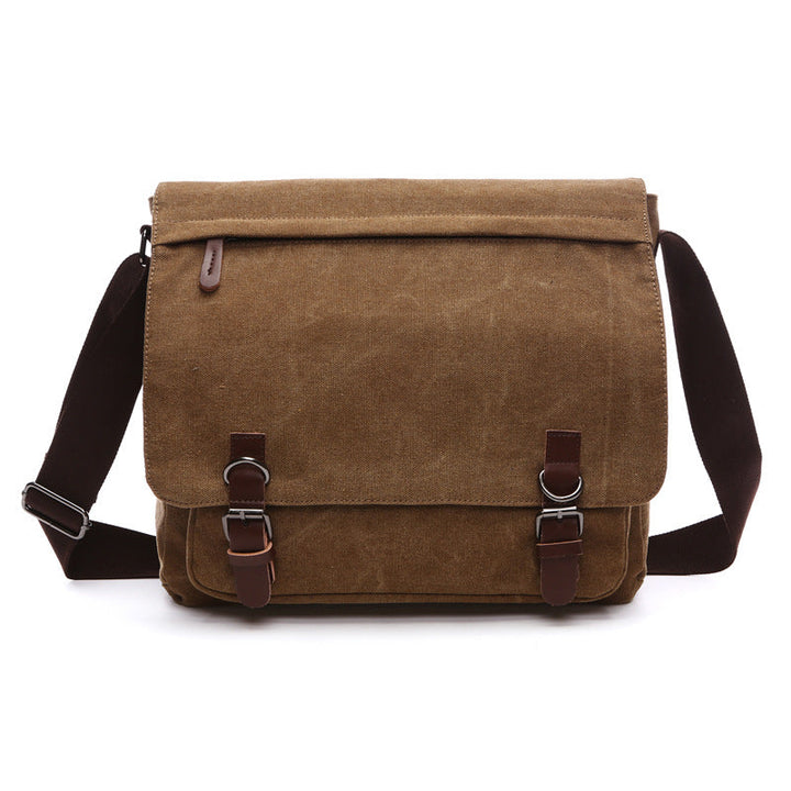 Stylish men's shoulder bag with robust buckle straps and large capacity for all your essentials.