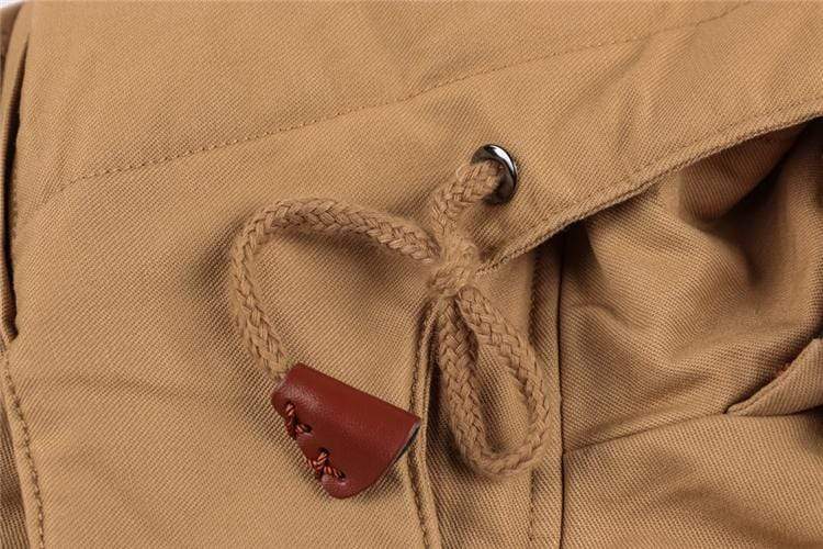 High-angle view of a men's heavy-duty pilot bomber jacket, folded to show its inner fleece lining