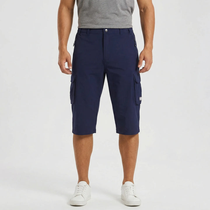 Khaki men's multi-pocket cargo shorts, ideal for travel and casual summer wear.