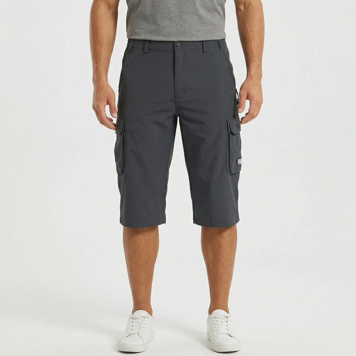 Front view of men's durable hiking cargo shorts with spacious side pockets & reinforced stitching.