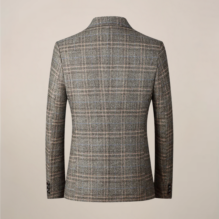 Close-up of intricate embroidery on a men's slim fit blazer, showcasing sophisticated style for special occasions.