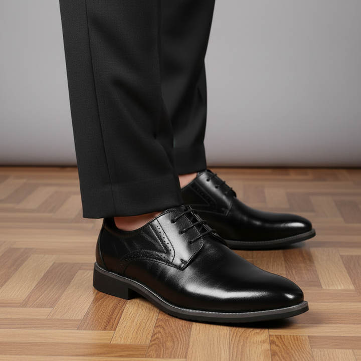 Men's elegant brogue dress shoes with premium Adrian leather upper, ideal for formal wear.