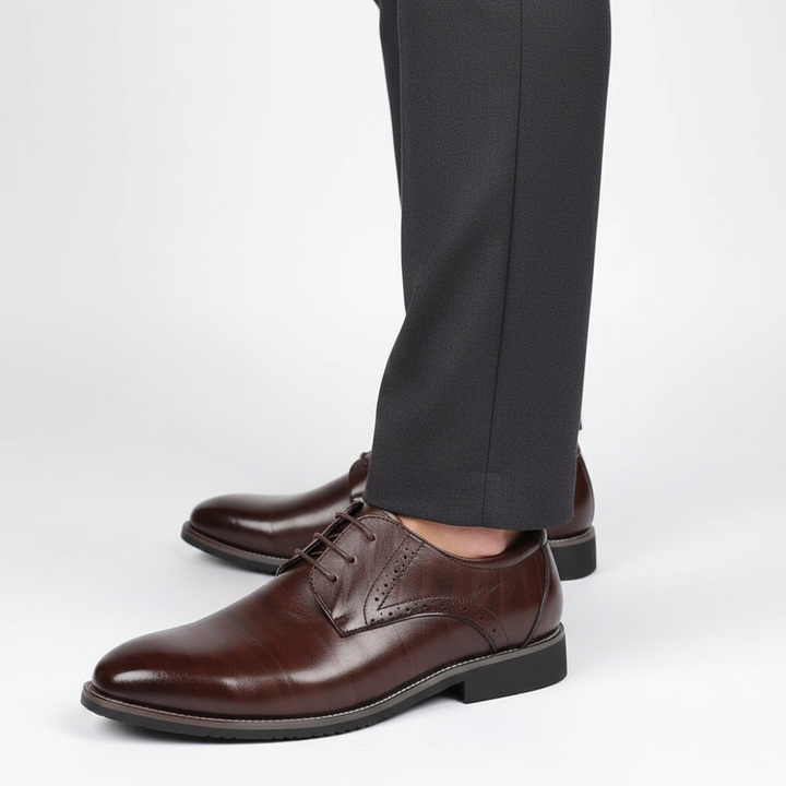 Comfortable men's brogue dress shoes with slip-resistant sole and shock-absorbing features for formal wear.