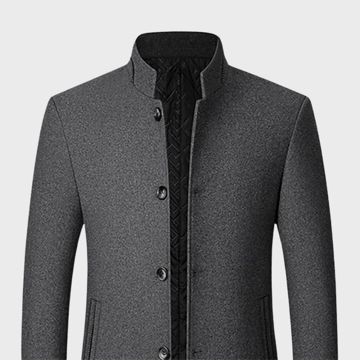 Fashionable men's tailored trench coat with a stand collar, perfect for smart professional outfits.