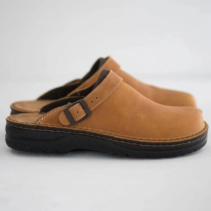 Black men's orthopedic clogs offering superior arch support & comfort. Perfect slip-on work shoe or casual footwear.