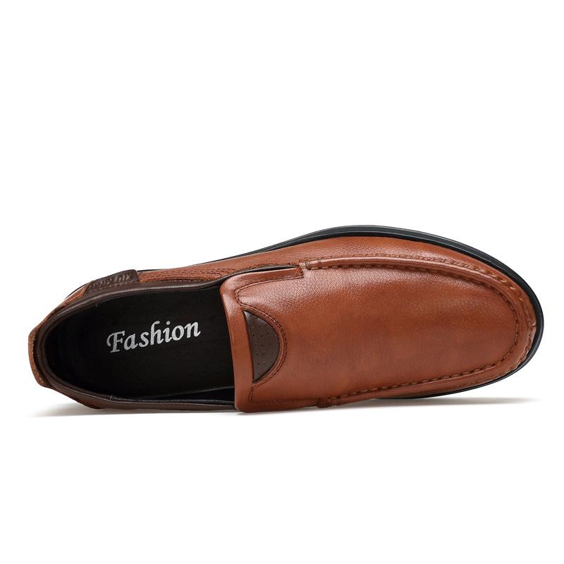 Classic men's black faux leather slip-on loafers for everyday wear.