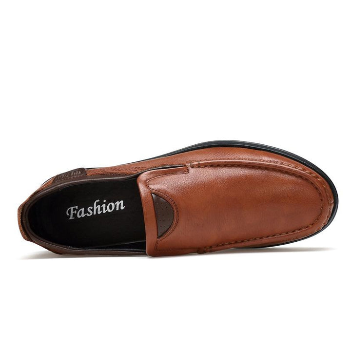 Classic men's black faux leather slip-on loafers for everyday wear.