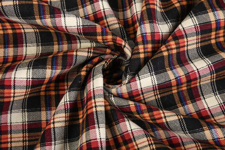 Man layering a red wine flannel lined button-up jacket over a hoodie, ideal for cold weather, casual style