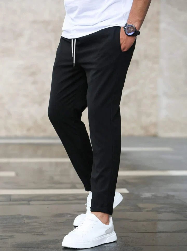 Stylish and flexible men's chino pants with drawstring for everyday comfort.