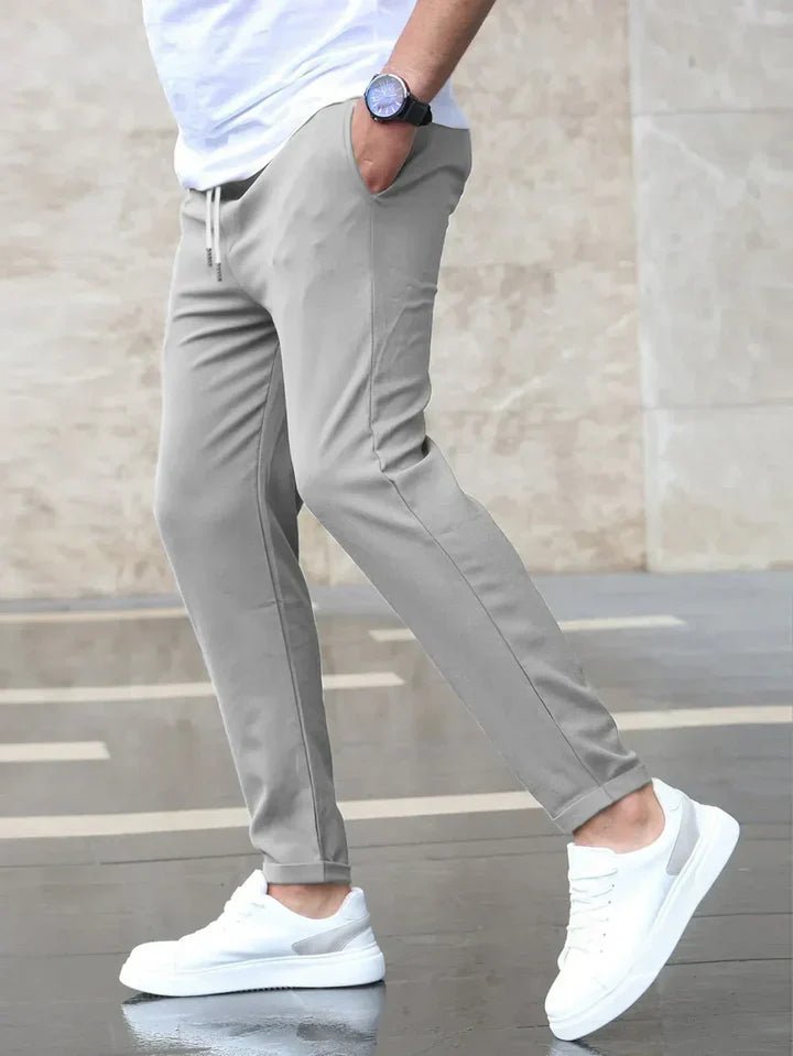 Men's casual drawstring chinos, slim fit and flexible for active lifestyles.