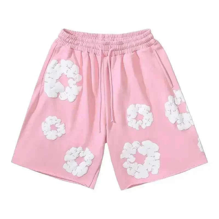 Trendy men's floral shorts for summer streetwear. Bold graphic print, ideal for casual outings, beach, or festival wear.