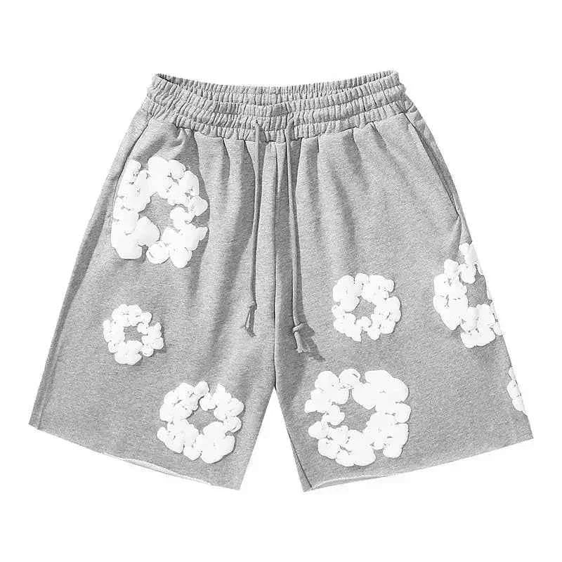 Comfortable men's casual shorts with a vibrant floral print. Perfect for summer fashion, beach days, or vacation outfits.