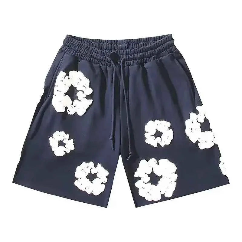 Summer-ready men's floral shorts. Versatile for beach, casual wear, or a bold festival outfit. Comfortable and stylish.