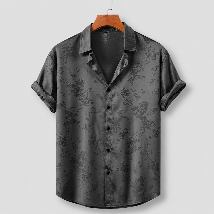 Short sleeve men's floral polo shirt, ideal for summer fashion, day to night casual elegance.