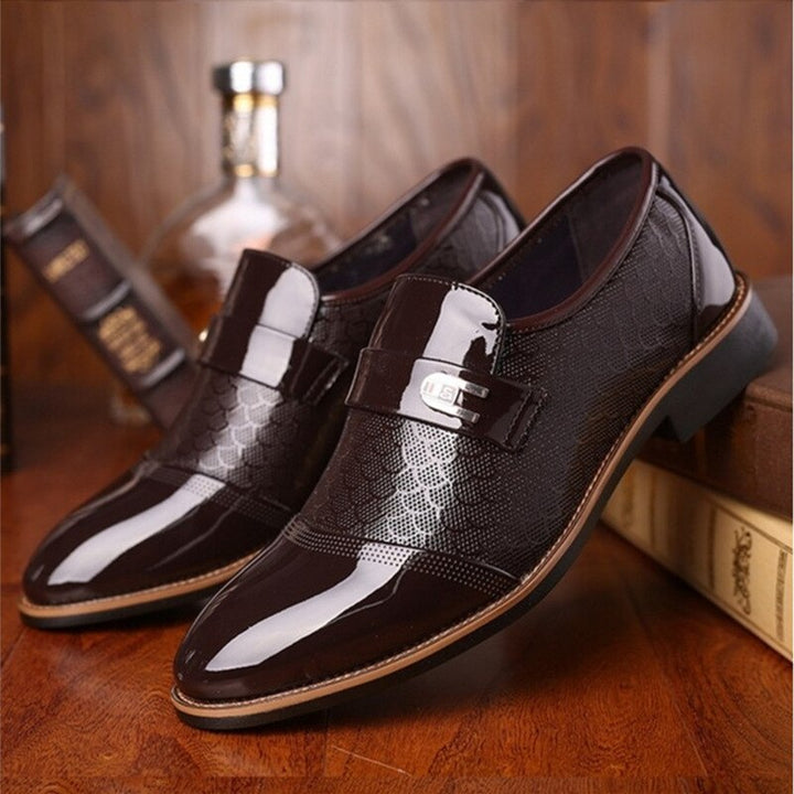 High shine patent leather men's dress shoes with stylish buckle, ideal for business & elegant events.