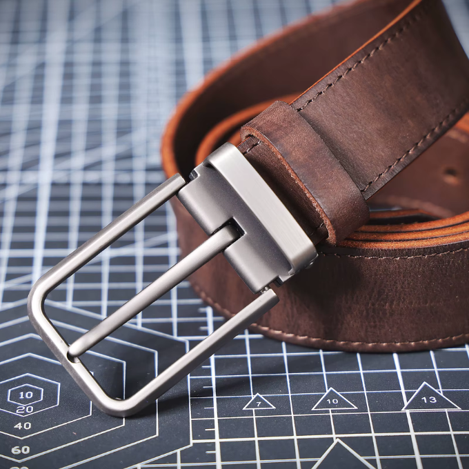 Men posing wearing a full-grain brown leather belt with jeans, showcasing casual style