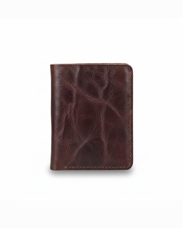 Men's full-grain leather bi-fold wallet, rich brown, showcasing durable construction and slim design.