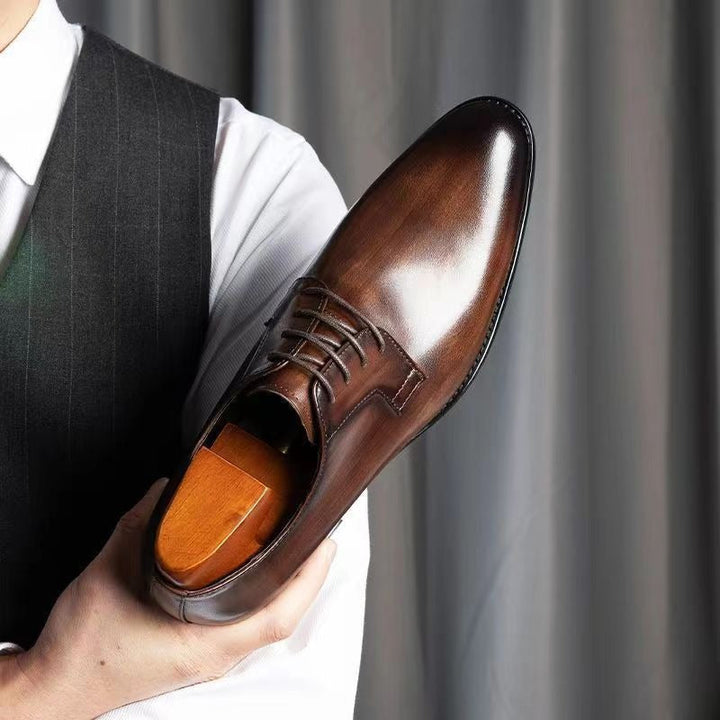 Classic black genuine leather men's dress shoes, stylish and comfortable formal footwear.