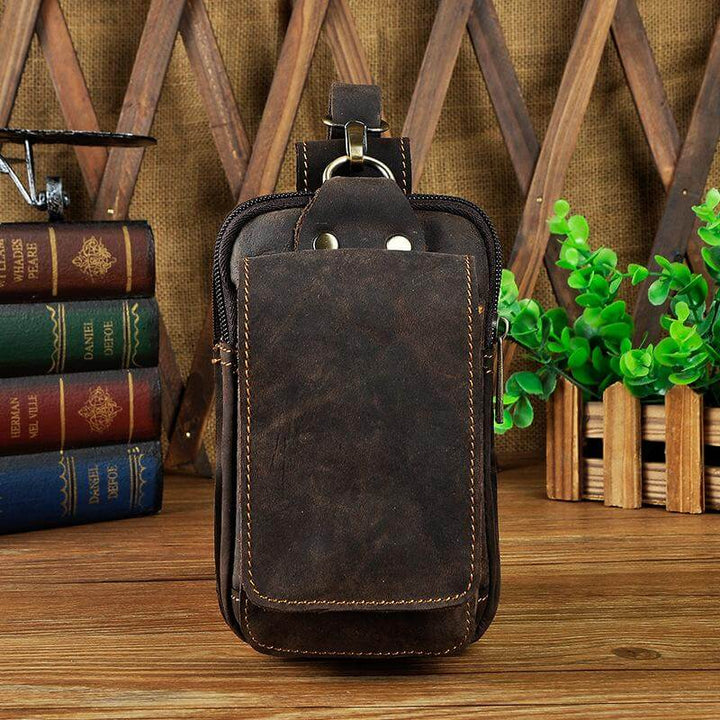 Black genuine leather fanny pack for men, perfect for travel & everyday carry.